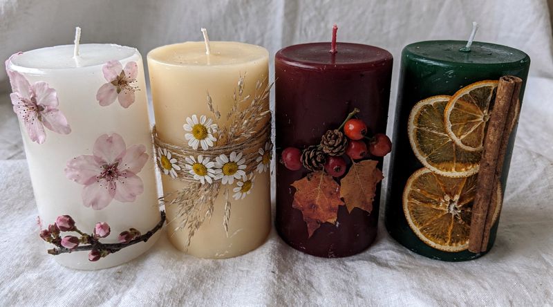 Vier Kerzen in den vier Jahreszeiten: Pastelltöne, Gold-Gräser, Herbstrot und Wintergrün