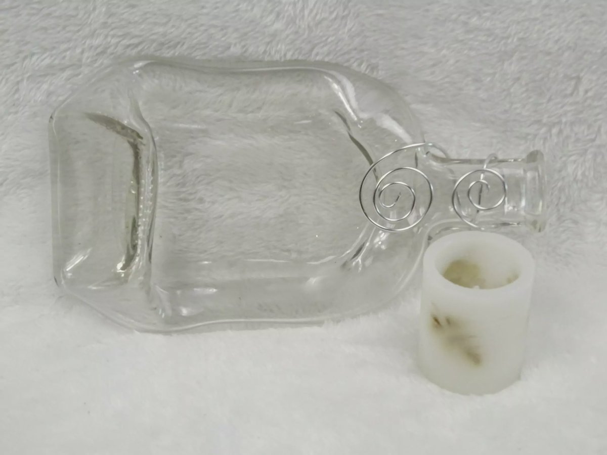 Flaschendeko klare Flasche mit Spiraldraht und Kerze